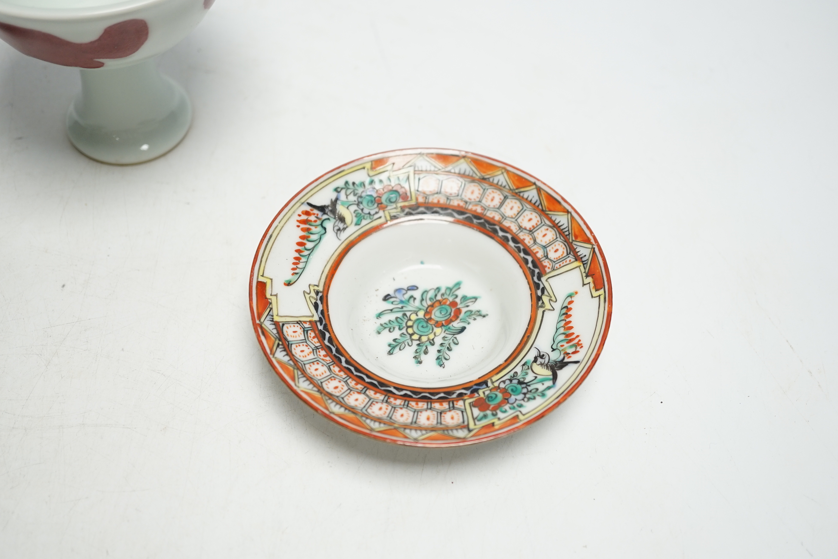 A Chinese tea bowl and stand, a white glazed horse and a pedestal bowl, tallest 9cm high